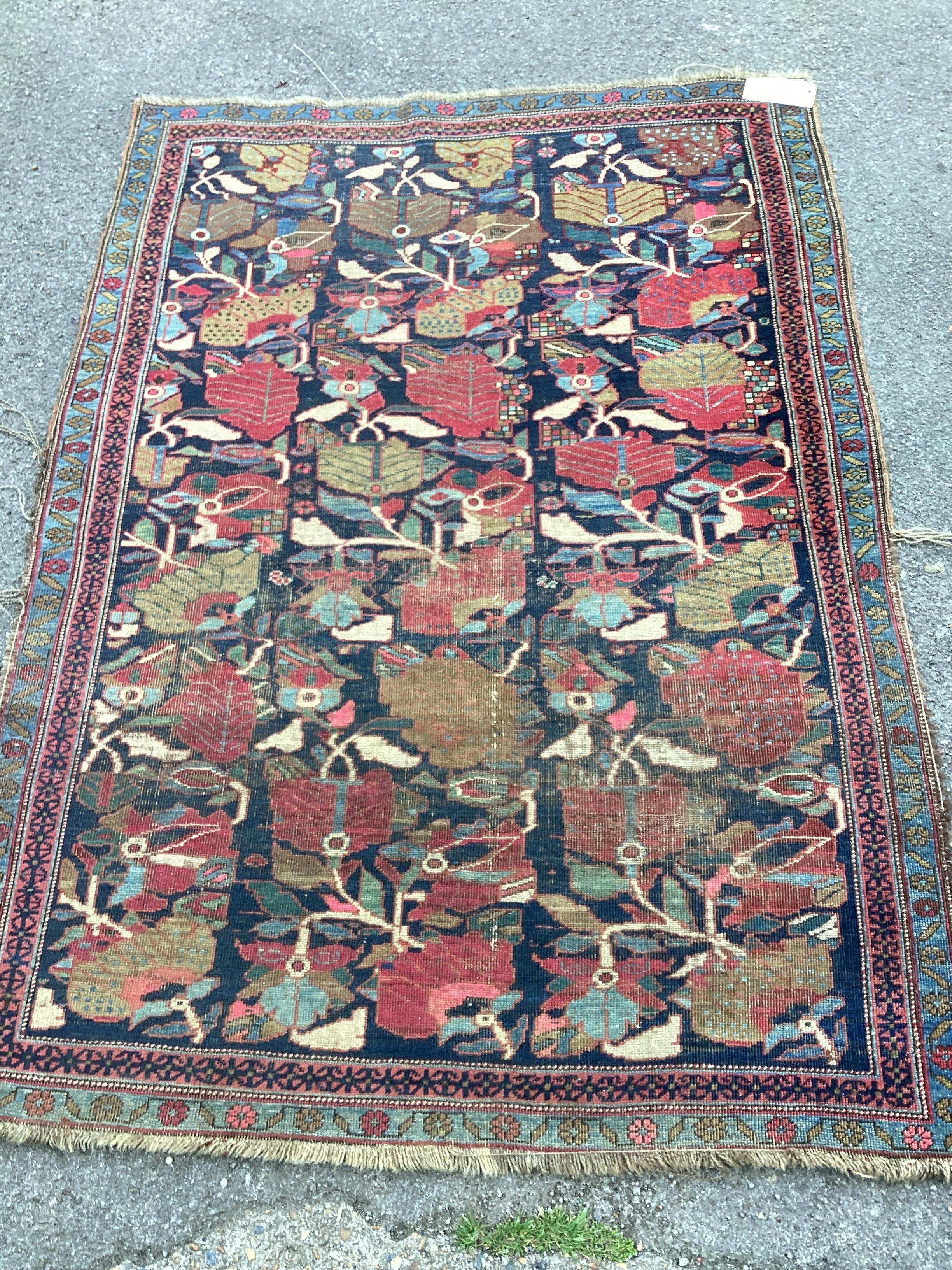 An antique Caucasian Karabagh blue ground rug, 177 x 126cm